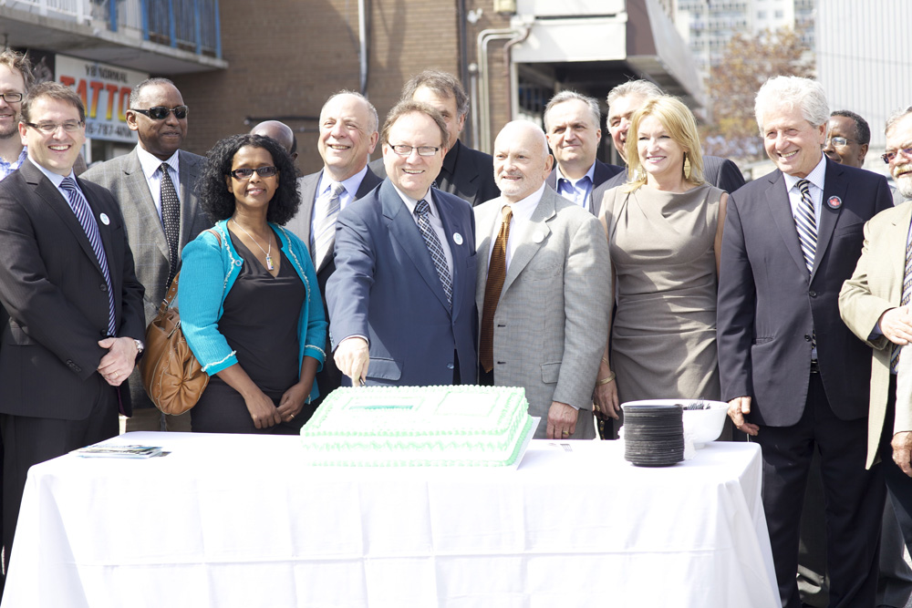 CEO and VIPs cut the cake to mark donation in support of Humber River Hospital.