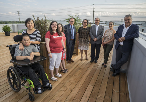 Clients and supporters gather on the IC Savings Rooftop Terrace.